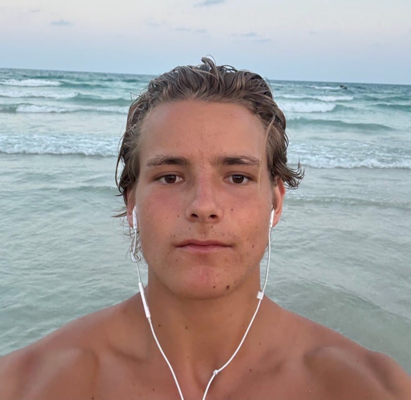 After: close-up of my face at the beach with clear skin